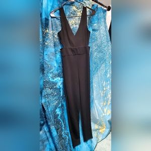 Womans Size Small Romper Pants Color Black